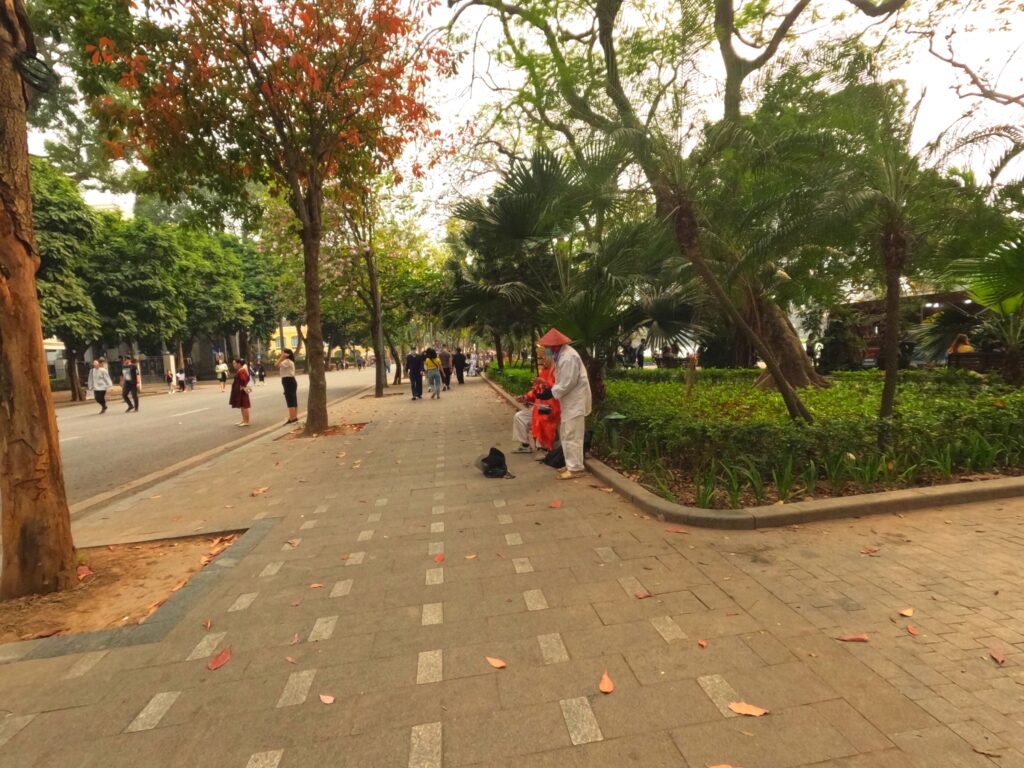 Locals performing in Hoan Kiem Lake